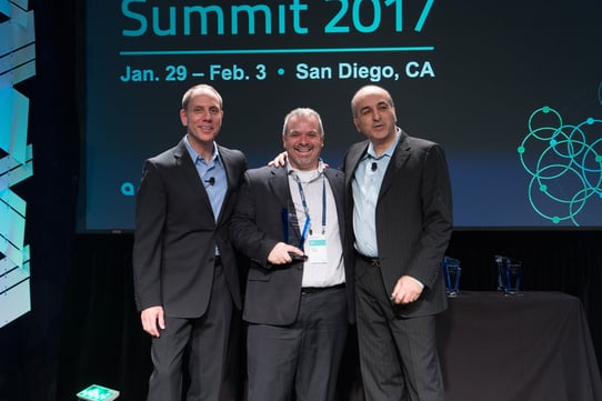 Gregg getting award with Jon and Ali.jpg